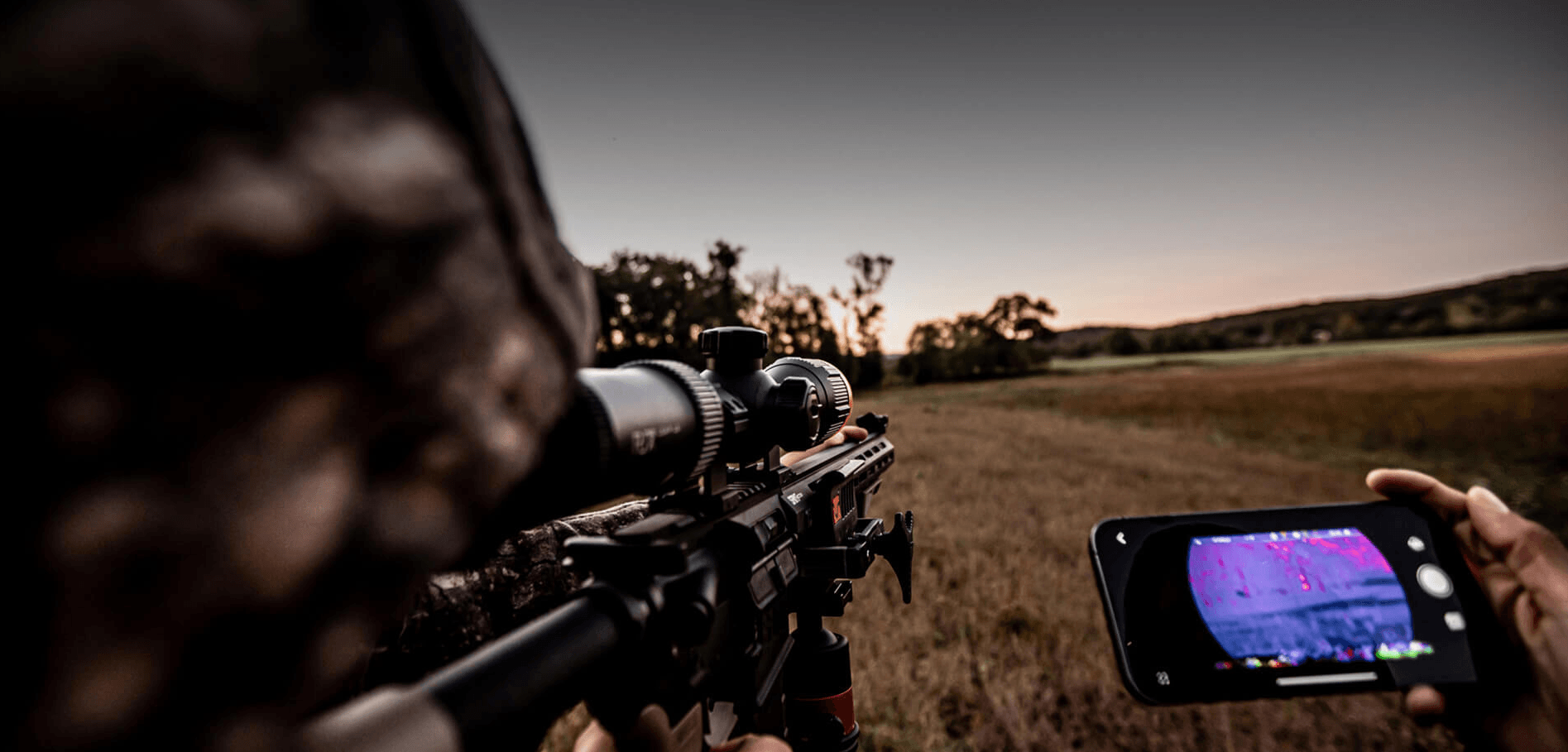 The hunter patiently monitors the prey, looking for an opportunity to shoot.