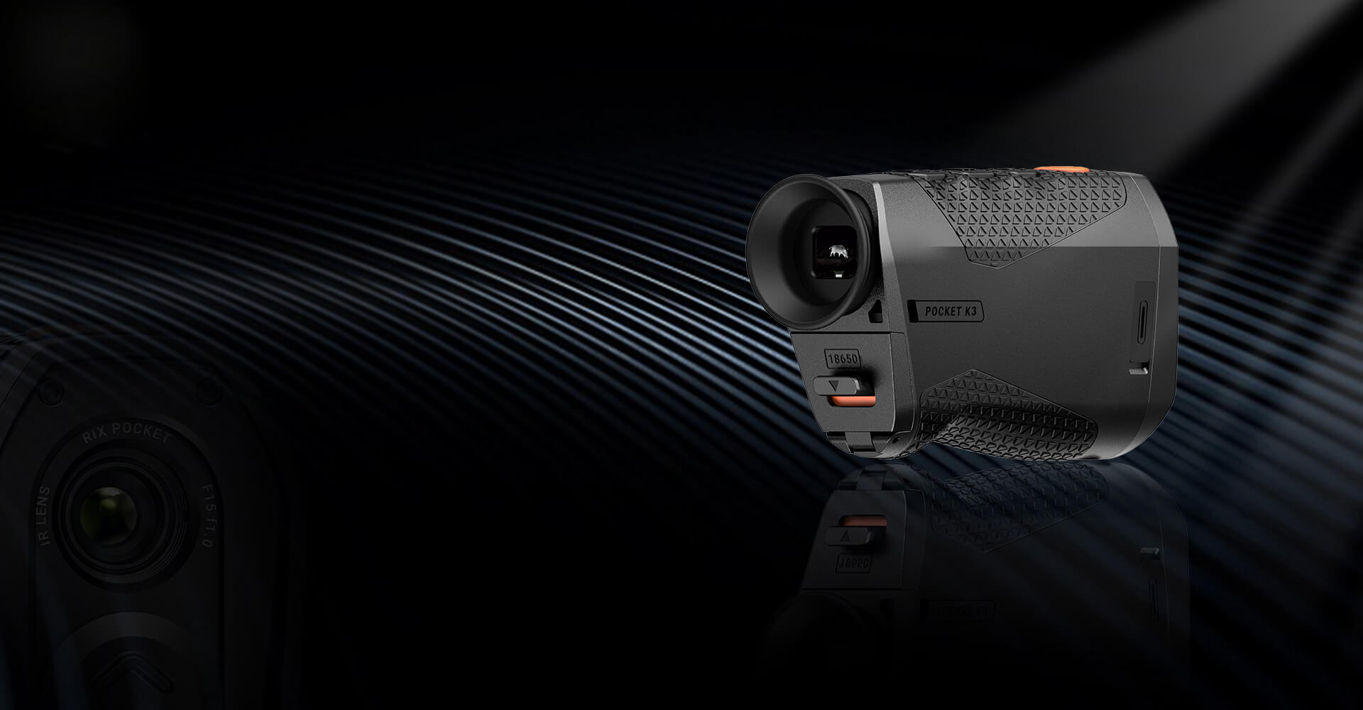 A sleek, black thermal imaging device with textured grip design