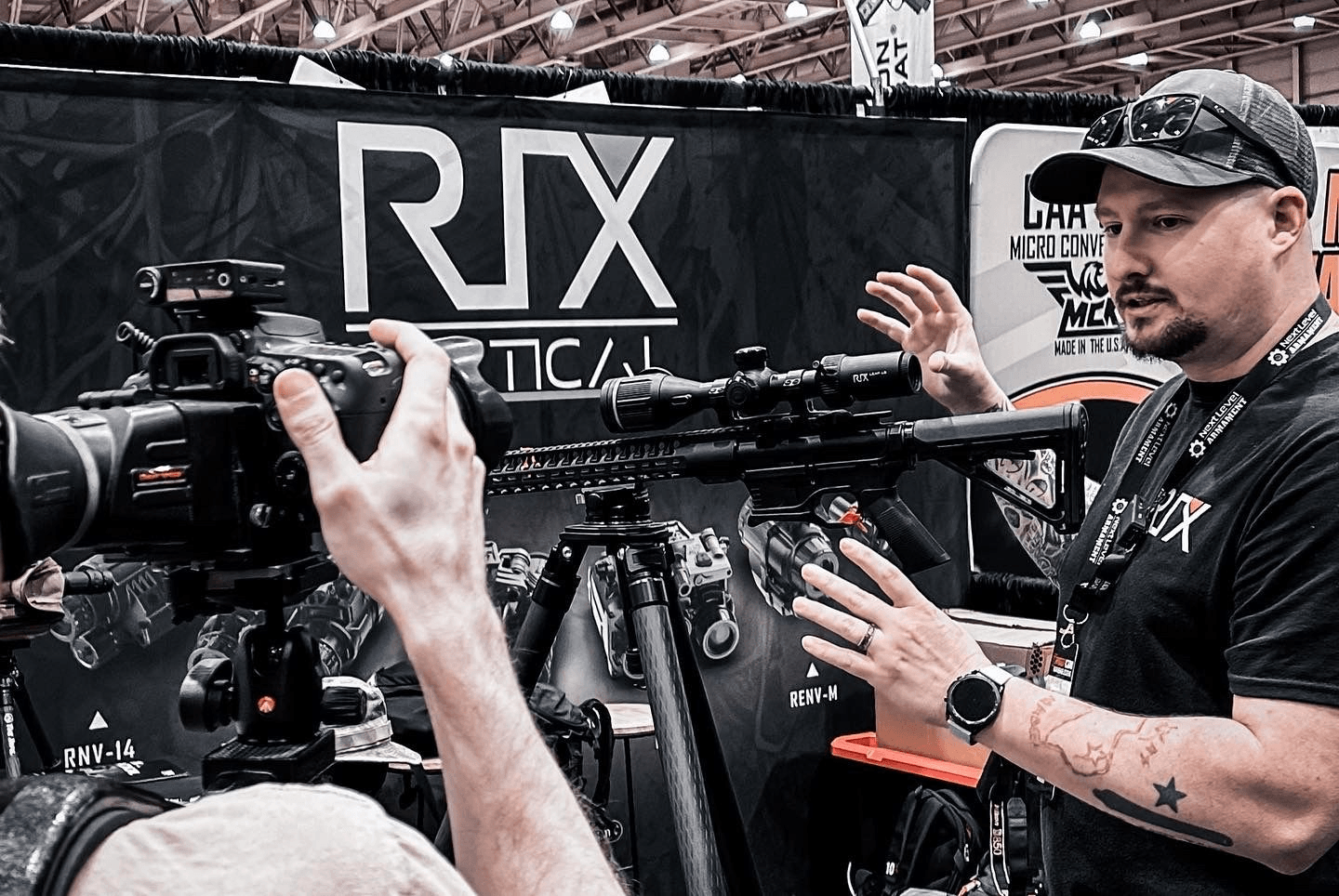 The Rix staff is showcasing the L6 Thermal Scope mounted on an AR-15 rifle.